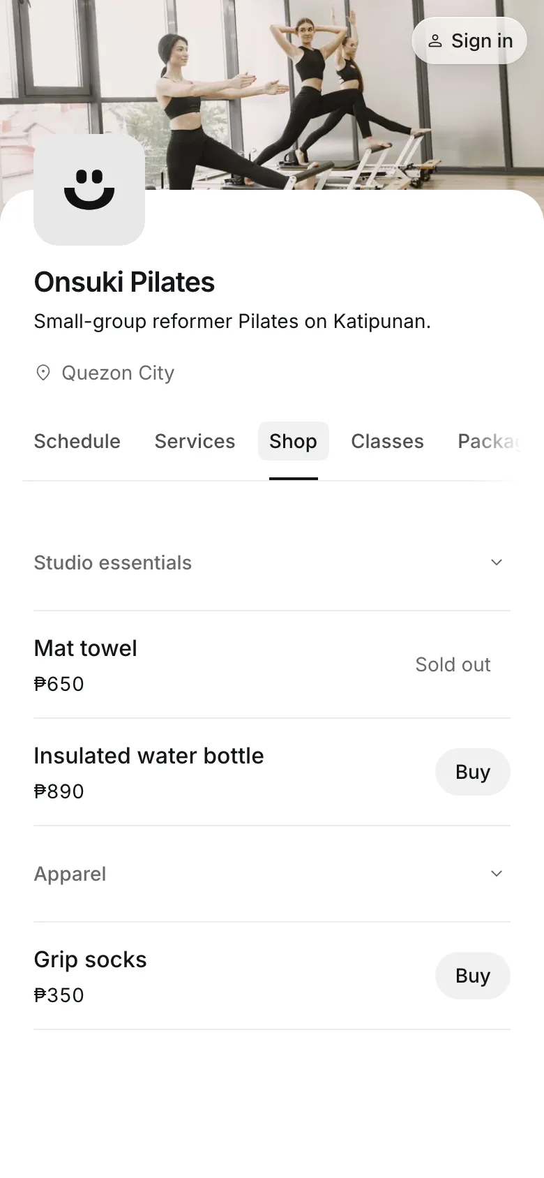 The Shop tab of a booking page on a phone, with products and their prices