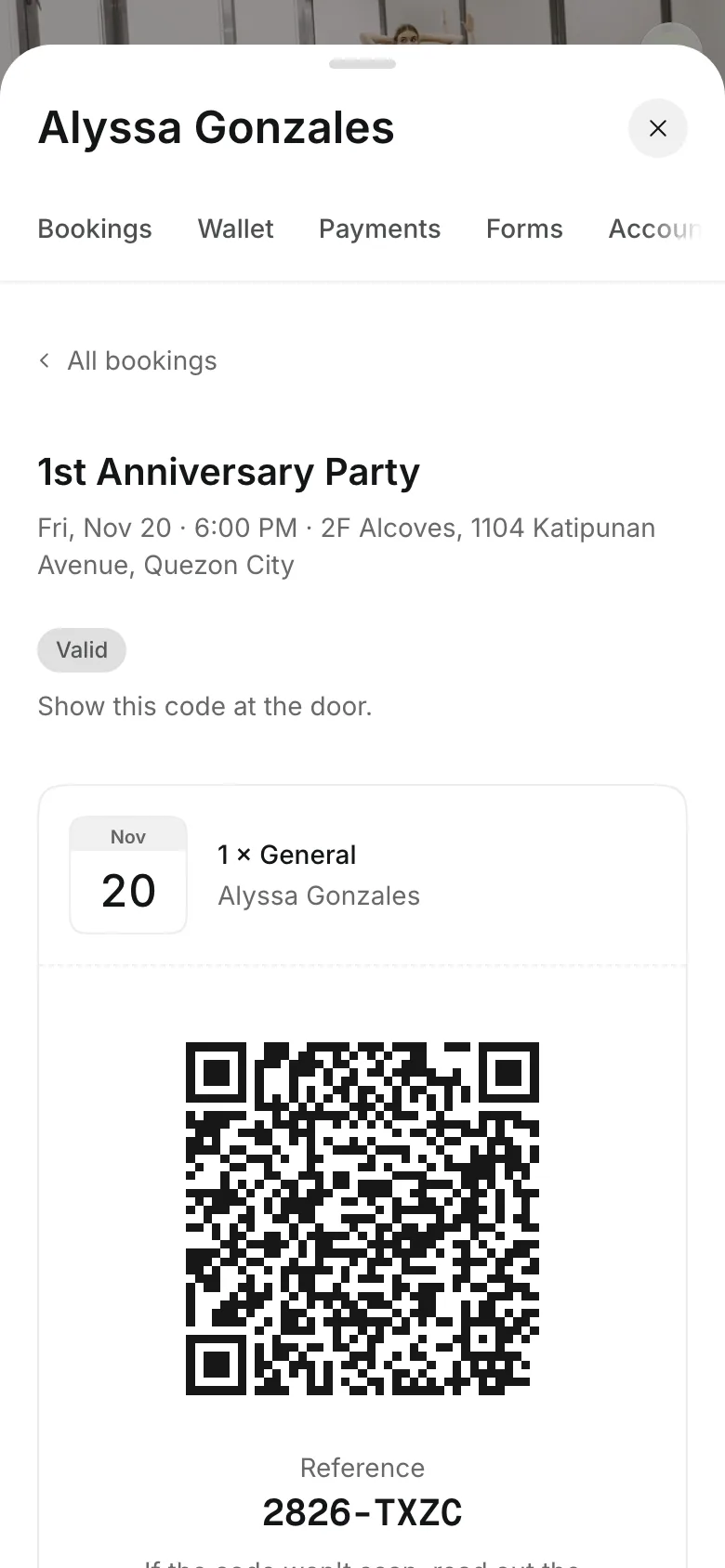 A client's ticket on a phone, with the code to show at the door