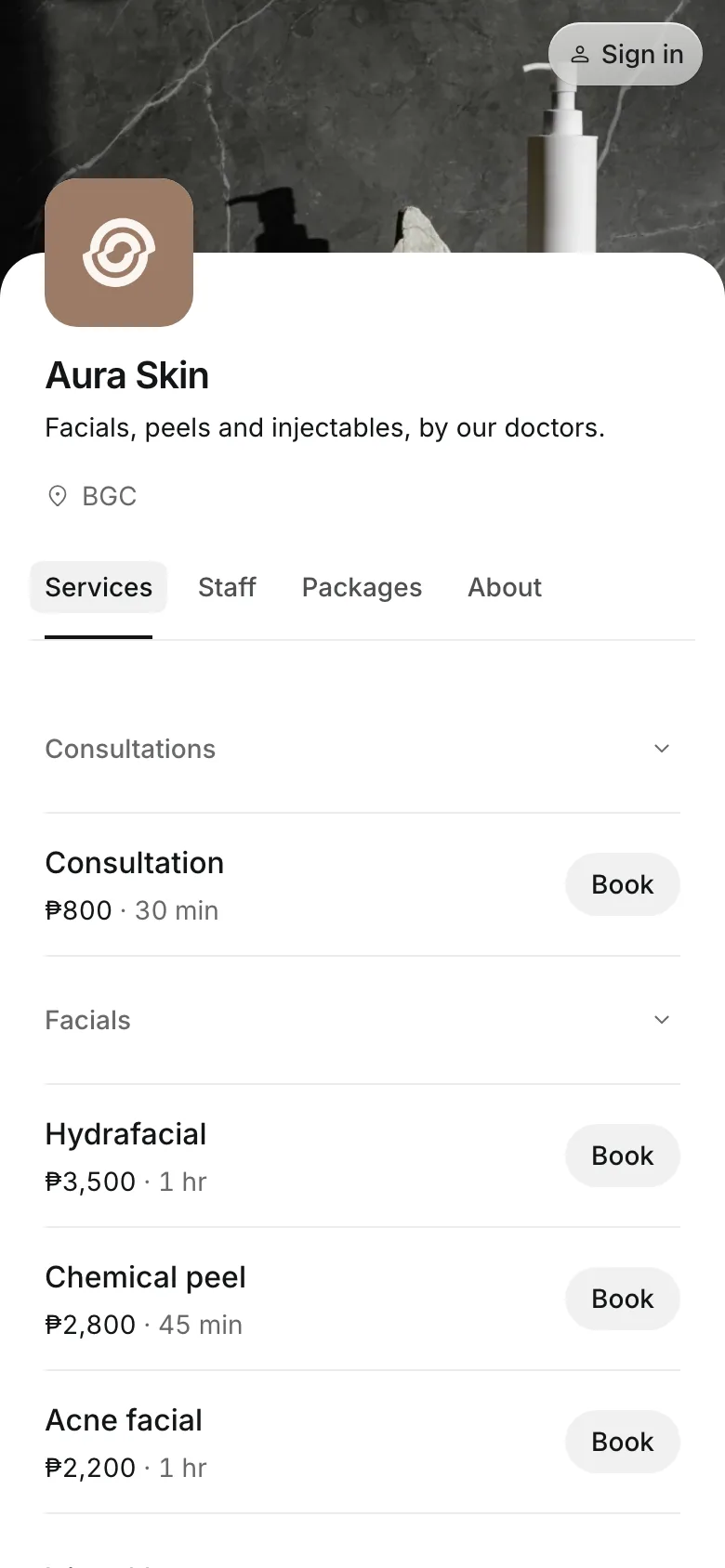 The business's booking page on a phone