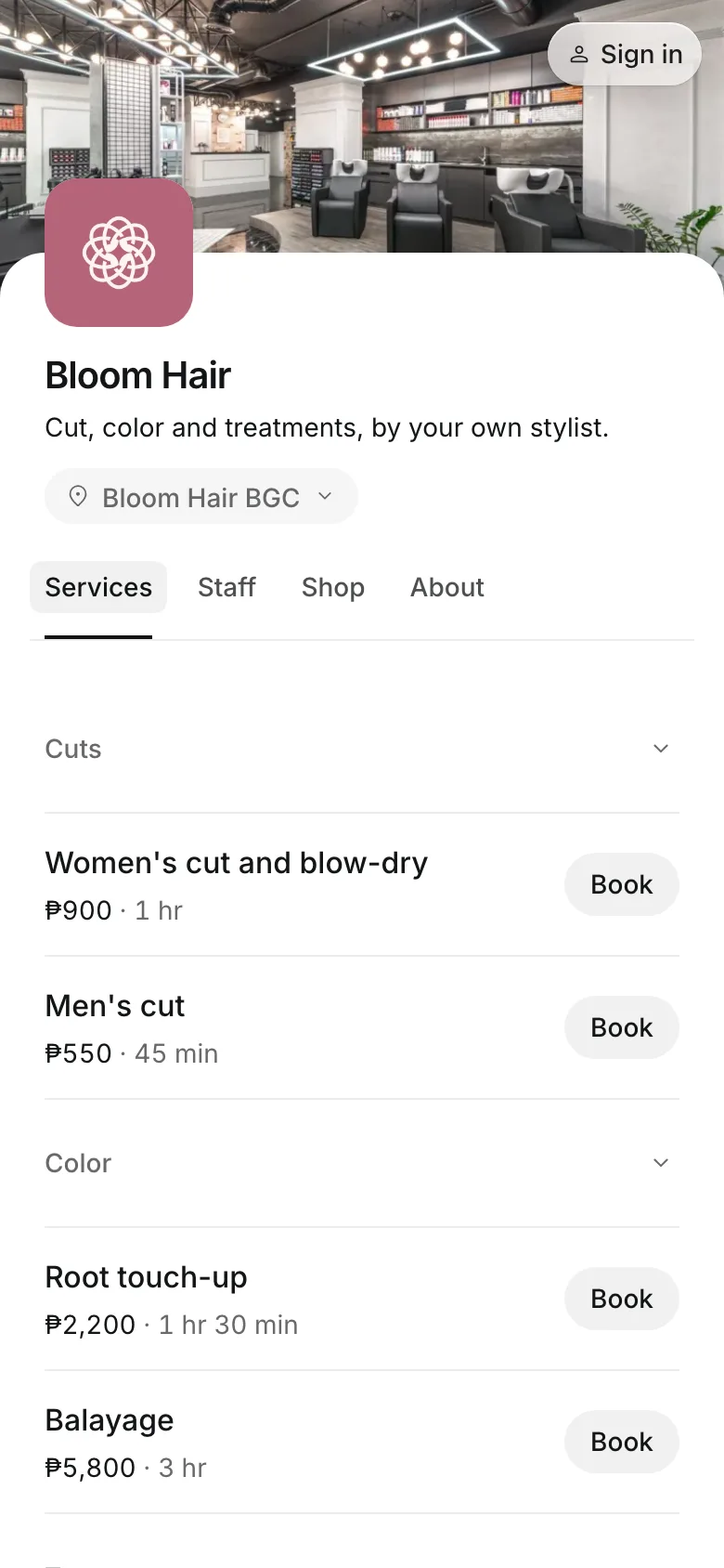 The business's booking page on a phone