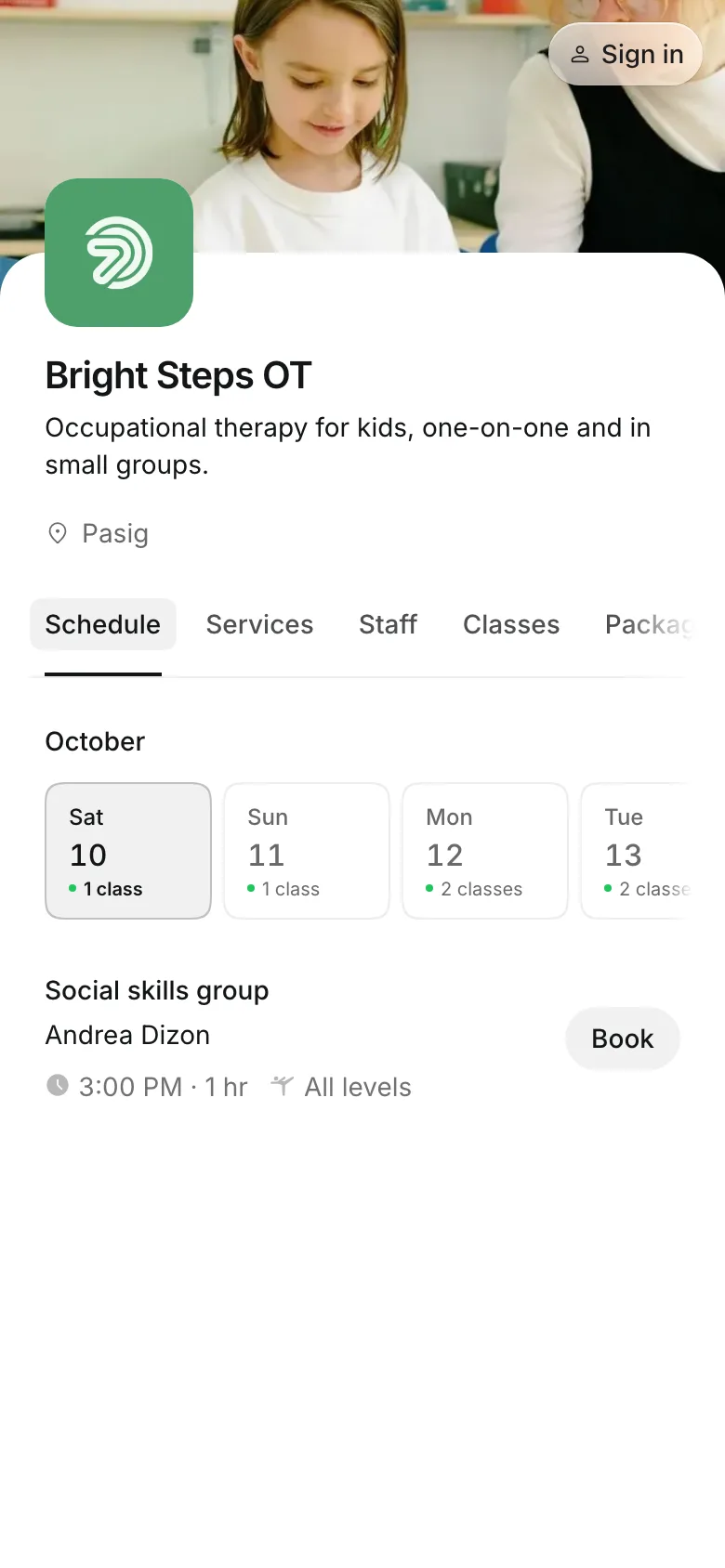 The business's booking page on a phone