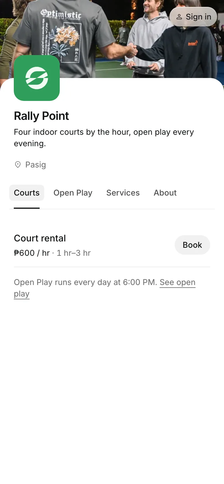 The business's booking page on a phone