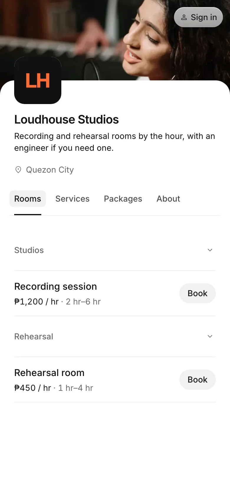 The business's booking page on a phone