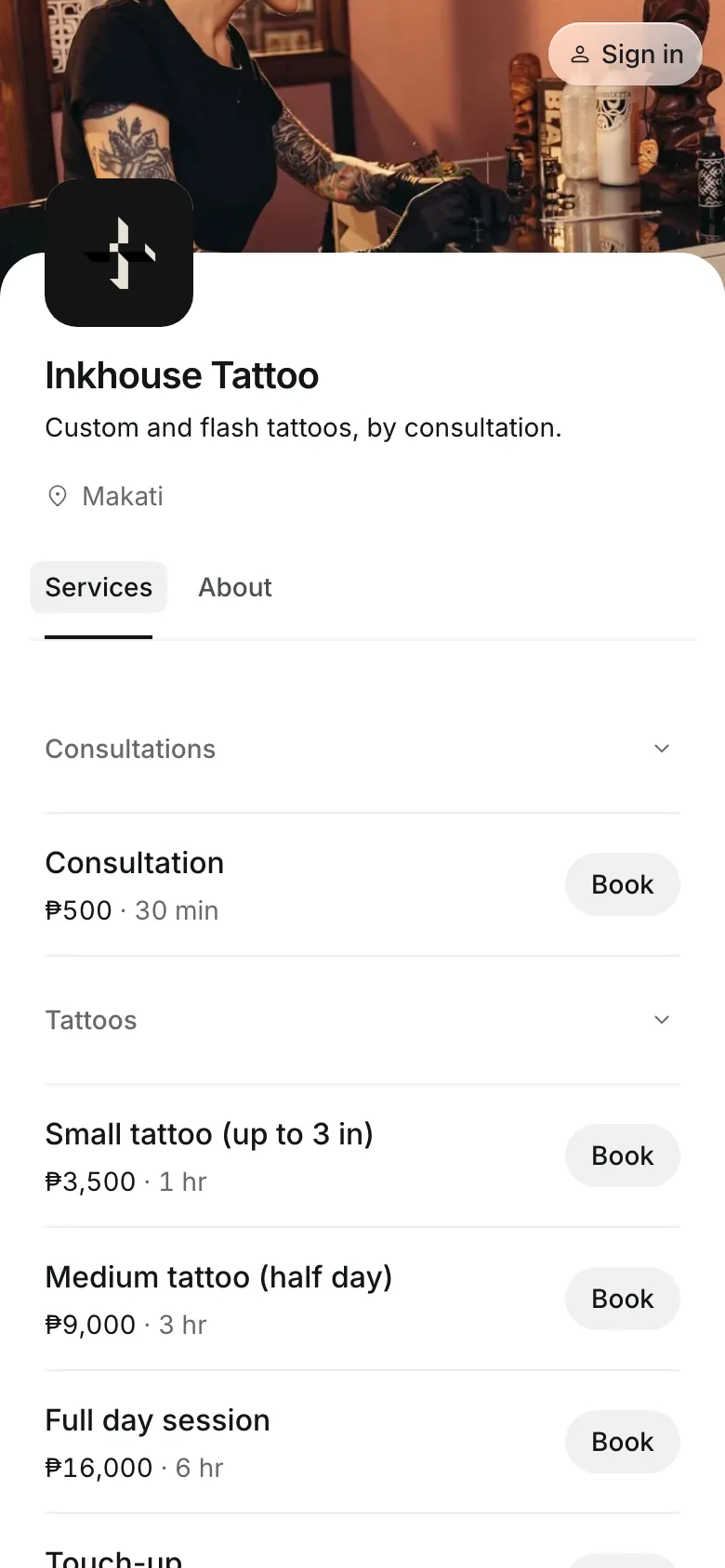The business's booking page on a phone