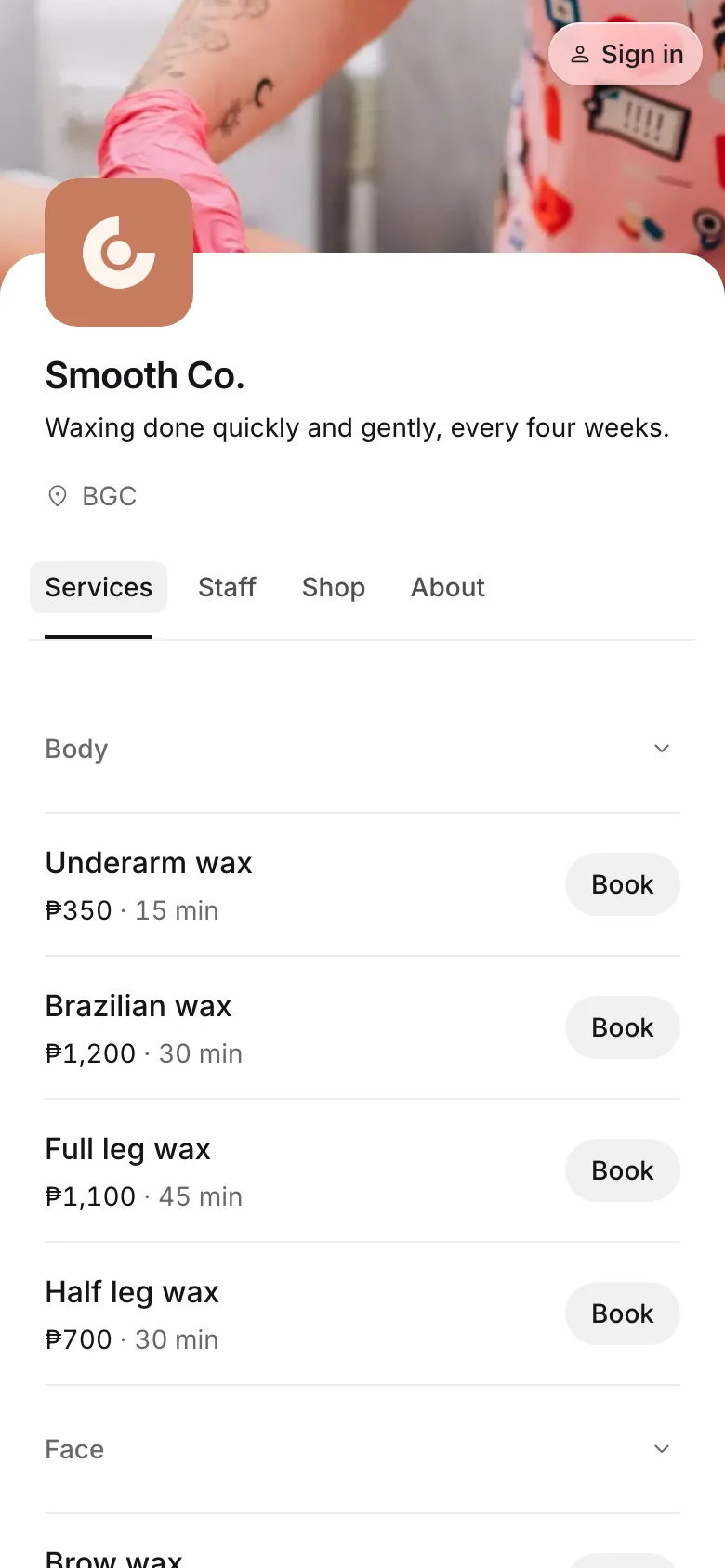 The business's booking page on a phone